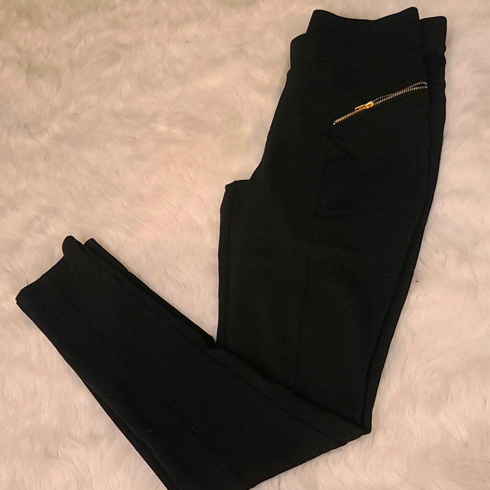 Black dress pants with gold zipper accents. Sz M
